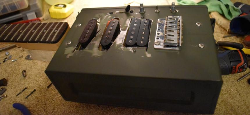 Guitarra caja de munición