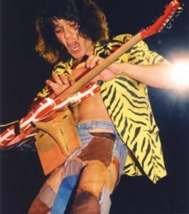 Edward_Van_Halen_performing_with_his_guitar_support.jpg