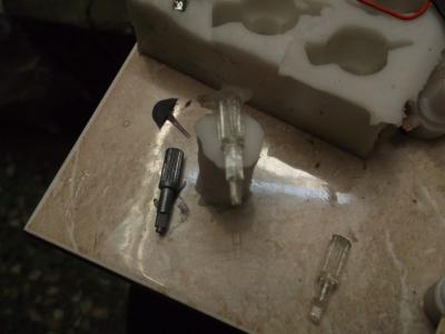 Eje de metal+molde+eje recién hecho+molde escondido.jpg