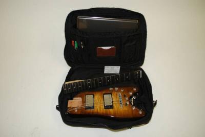 Tobacco_Sunburst_professional_electric_travel_guitar_in_computer_bag_op_800x535.jpg