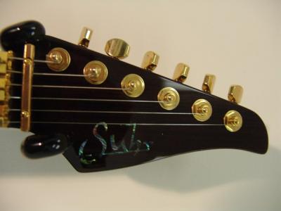 Suhr-Reb-Beach-Headstock.jpg