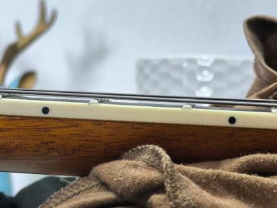 Medida en el 6to traste mientras presiono el primer y el 12vo traste.jpg