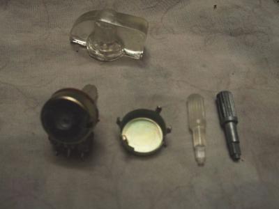eje transparente+eje metálico+pote con agujero+tambor desarmado.jpg