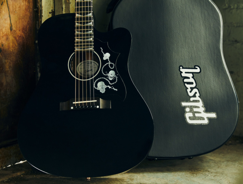 Gibson Dave Mustaine Songwriter junto a estuche