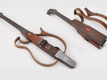 Mogabi: Una guitarra acústica de viaje plegable, con amplificador, bluetooth, reverb, y grabadora